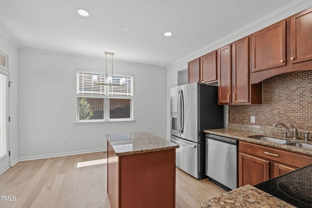 3204 Plaza Pl, Raleigh, NC 27612 - kitchen with stainless steel appliances, crown molding, light wood finished floors, backsplash, and light stone countertops