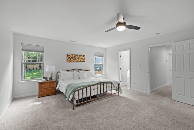 3204 Plaza Pl, Raleigh, NC 27612 - bedroom with multiple windows, carpet flooring, and a ceiling fan