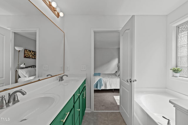 3204 Plaza Pl, Raleigh, NC 27612 - ensuite bathroom with double vanity, tile patterned floors, plenty of natural light, and a bath