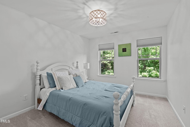 3204 Plaza Pl, Raleigh, NC 27612 - carpeted bedroom with baseboards