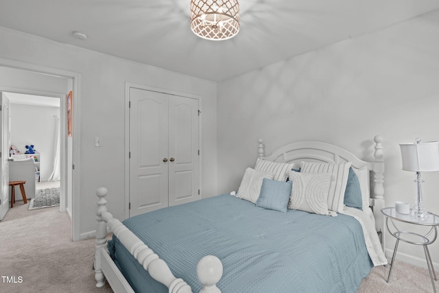 3204 Plaza Pl, Raleigh, NC 27612 - carpeted bedroom featuring baseboards and a closet