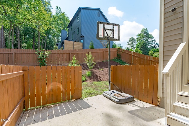 3204 Plaza Pl, Raleigh, NC 27612 - fenced backyard featuring a patio area