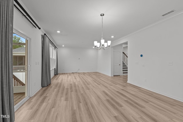 125 Shadowdale Ln, Rolesville, NC 27571 - spare room with stairs, a chandelier, recessed lighting, light wood finished floors, and ornamental molding