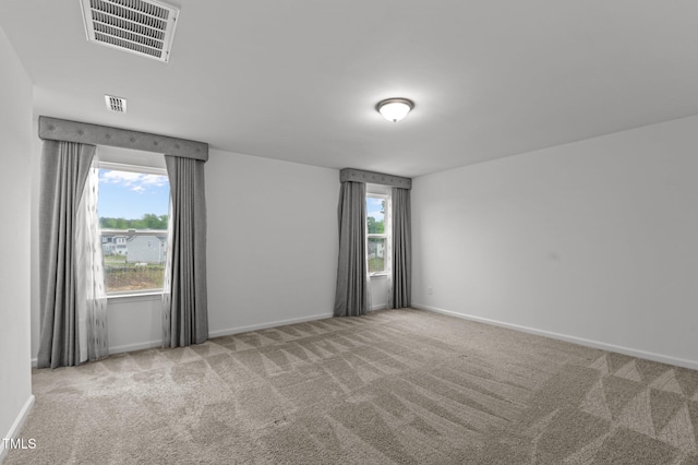 125 Shadowdale Ln, Rolesville, NC 27571 - carpeted empty room featuring plenty of natural light and baseboards