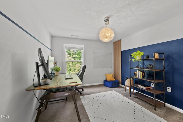 carpeted office with baseboards