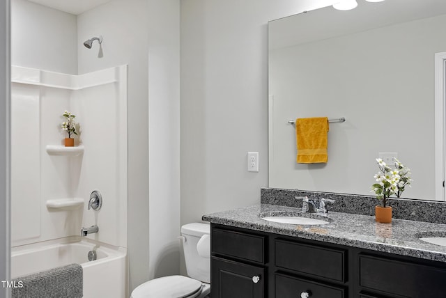 bathroom featuring toilet, double vanity, and shower / tub combination