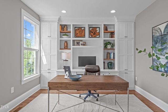 2711 Jordan Pointe Blvd, New Hill, NC 27562 - office area with healthy amount of natural light, baseboards, wood finished floors, and recessed lighting
