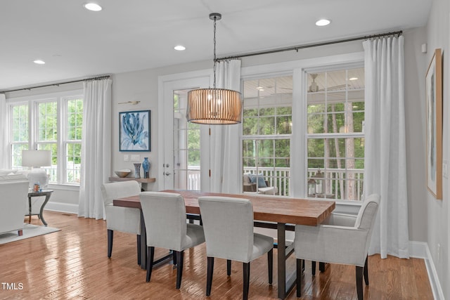 2711 Jordan Pointe Blvd, New Hill, NC 27562 - dining area with baseboards, wood finished floors, and recessed lighting