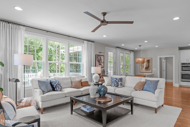 2711 Jordan Pointe Blvd, New Hill, NC 27562 - living room with ceiling fan, recessed lighting, and light wood-style flooring
