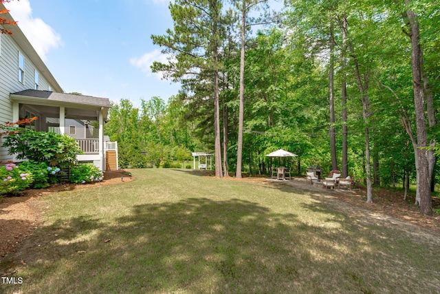 2711 Jordan Pointe Blvd, New Hill, NC 27562 - view of grassy yard featuring a sunroom