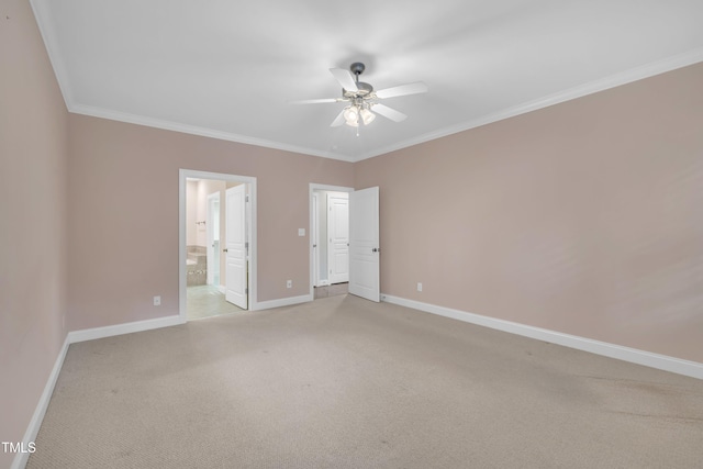 unfurnished bedroom featuring light colored carpet, baseboards, ornamental molding, connected bathroom, and ceiling fan