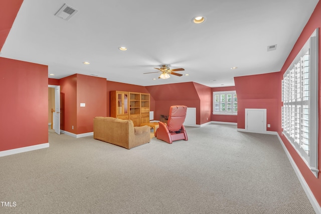 unfurnished living room featuring carpet floors, baseboards, ceiling fan, and recessed lighting