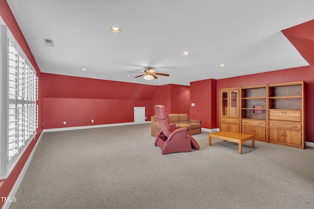 living area with carpet floors, recessed lighting, baseboards, and a ceiling fan
