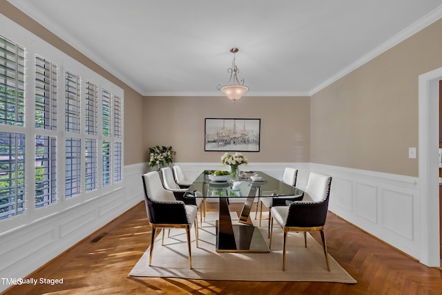1608 Heritage Links Dr, Wake Forest, NC 27587 - dining area with healthy amount of natural light, ornamental molding, and a wainscoted wall