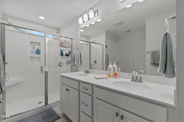 8925 Lee Brown Ridge Dr, Wake Forest, NC 27587 - full bath featuring a stall shower, double vanity, and tile patterned flooring