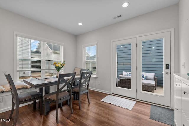 8925 Lee Brown Ridge Dr, Wake Forest, NC 27587 - dining area featuring wood finished floors, baseboards, and recessed lighting