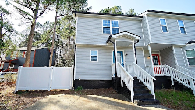 4613 Nesbit Ct, Raleigh, NC 27616 - view of front facade featuring fence and crawl space