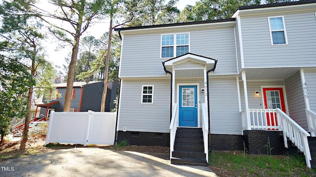 4613 Nesbit Ct, Raleigh, NC 27616 - view of front facade featuring fence and crawl space