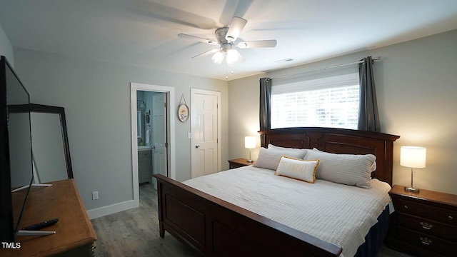 4613 Nesbit Ct, Raleigh, NC 27616 - bedroom featuring light wood-type flooring, baseboards, a ceiling fan, and ensuite bath