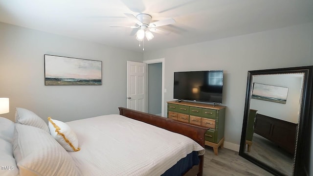 4613 Nesbit Ct, Raleigh, NC 27616 - bedroom featuring light wood-style flooring, a ceiling fan, and baseboards