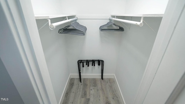 4613 Nesbit Ct, Raleigh, NC 27616 - walk in closet with wood finished floors