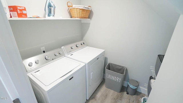 4613 Nesbit Ct, Raleigh, NC 27616 - laundry room featuring independent washer and dryer and light wood-type flooring