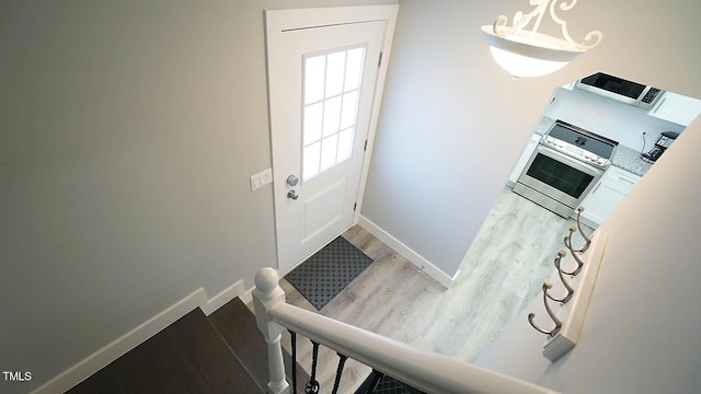 4613 Nesbit Ct, Raleigh, NC 27616 - entryway featuring wood finished floors and baseboards