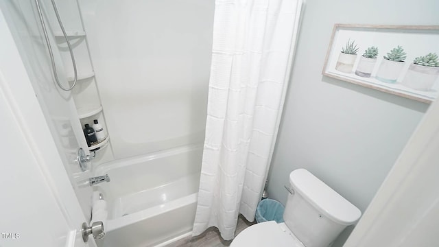 4613 Nesbit Ct, Raleigh, NC 27616 - bathroom featuring shower / bathtub combination with curtain and toilet