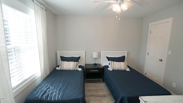 4613 Nesbit Ct, Raleigh, NC 27616 - bedroom with wood finished floors and a ceiling fan