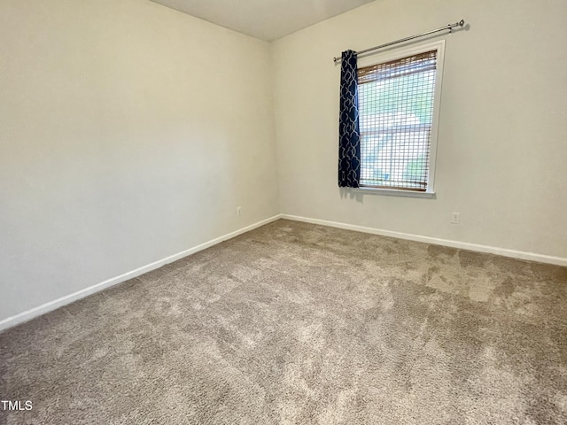 8813 Moss Glen Dr, Raleigh, NC 27617 - spare room featuring carpet and baseboards