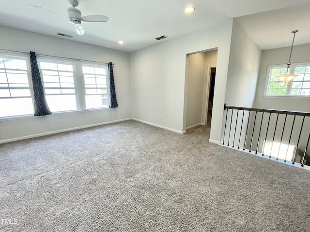 8813 Moss Glen Dr, Raleigh, NC 27617 - carpeted empty room featuring a ceiling fan, baseboards, and recessed lighting