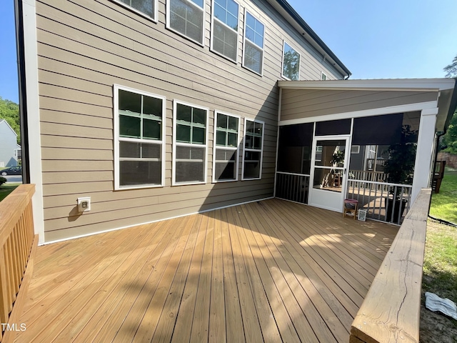 8813 Moss Glen Dr, Raleigh, NC 27617 - wooden deck featuring a sunroom