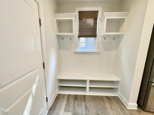 8813 Moss Glen Dr, Raleigh, NC 27617 - mudroom with baseboards and wood finished floors