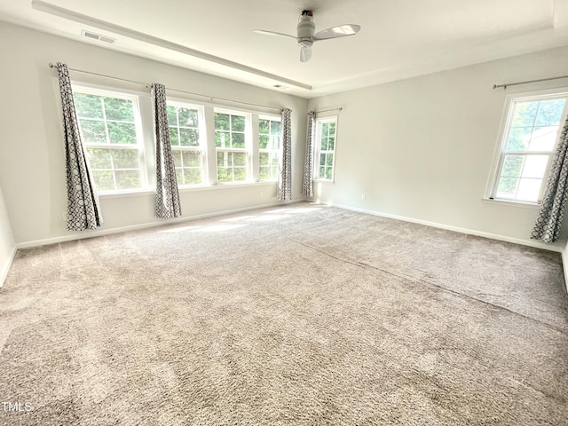 8813 Moss Glen Dr, Raleigh, NC 27617 - empty room with a ceiling fan, baseboards, and carpet floors