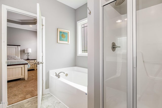 full bath featuring a shower stall, connected bathroom, marble finish flooring, a garden tub, and baseboards