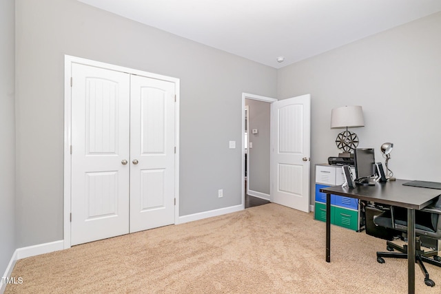 office area with carpet flooring and baseboards