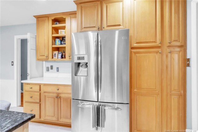 503 Charleston Pl, Fayetteville, NC 28303 - kitchen with stainless steel refrigerator with ice dispenser, open shelves, and light brown cabinetry