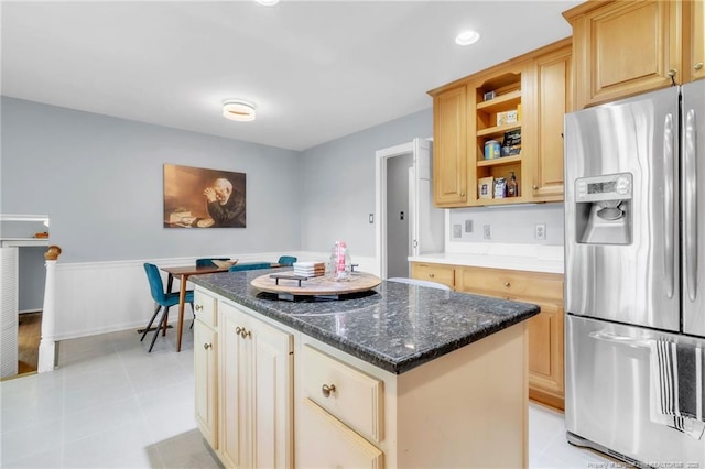 503 Charleston Pl, Fayetteville, NC 28303 - kitchen featuring stainless steel refrigerator with ice dispenser, open shelves, a center island, dark stone counters, and wainscoting