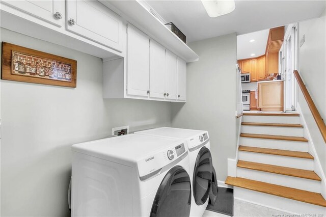 503 Charleston Pl, Fayetteville, NC 28303 - laundry room featuring separate washer and dryer, cabinet space, recessed lighting, and baseboards