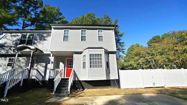 view of front of home with fence