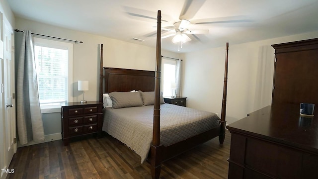 bedroom with dark wood-style flooring and ceiling fan