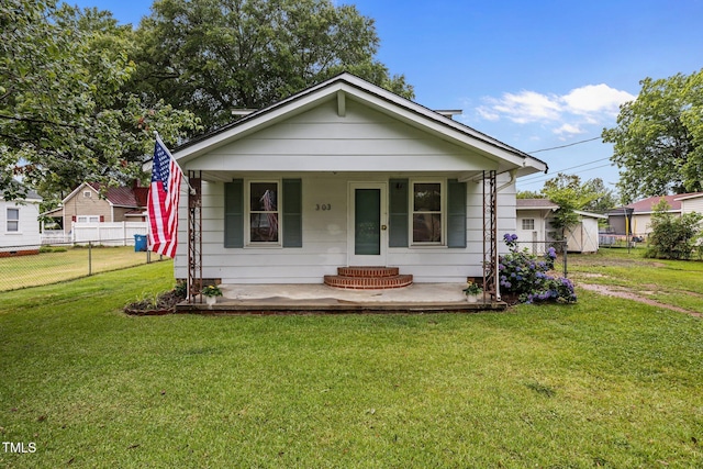 303 N Watauga Ave, Dunn, NC 28334 - bungalow-style home with covered porch
