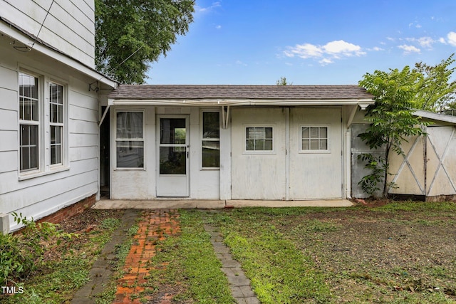 303 N Watauga Ave, Dunn, NC 28334 - rear view of property with roof with shingles