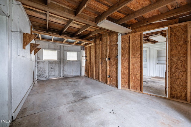 303 N Watauga Ave, Dunn, NC 28334 - misc room featuring concrete flooring and a garage