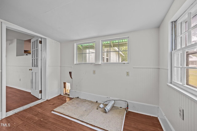 303 N Watauga Ave, Dunn, NC 28334 - unfurnished room with wood finished floors and baseboards