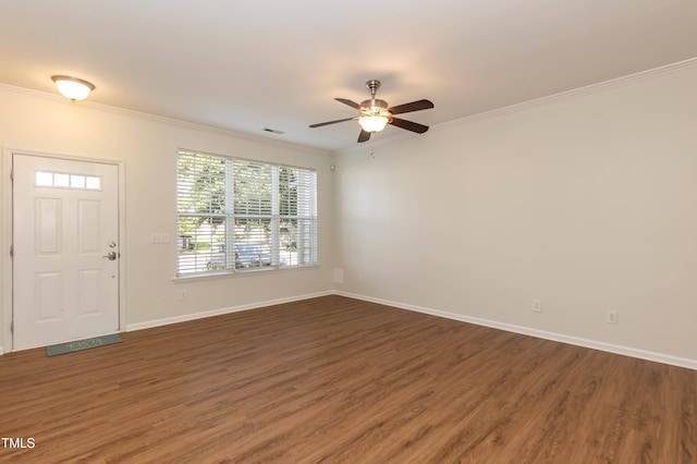 entrance foyer with crown molding, wood finished floors, ceiling fan, and baseboards