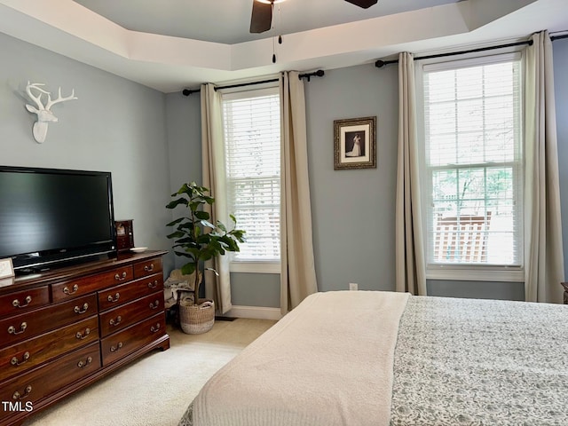 327 Beavertail Rd, Henderson, NC 27537 - bedroom featuring light carpet, baseboards, and a ceiling fan