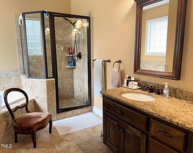 327 Beavertail Rd, Henderson, NC 27537 - bathroom featuring a shower stall, tile patterned floors, and vanity