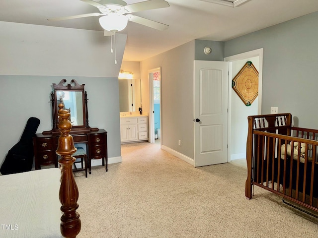 327 Beavertail Rd, Henderson, NC 27537 - bedroom featuring light colored carpet, baseboards, ceiling fan, and connected bathroom