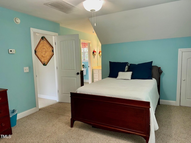 327 Beavertail Rd, Henderson, NC 27537 - bedroom featuring light colored carpet, vaulted ceiling, and baseboards